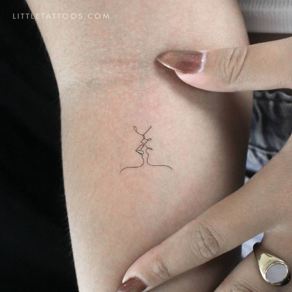 Small kiss by Harmlessberry temporary tattoo.