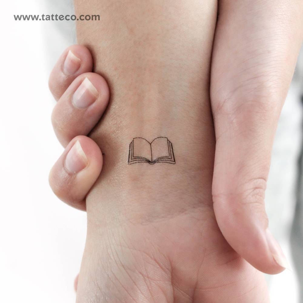 Open book temporary tattoo located on the wrist.