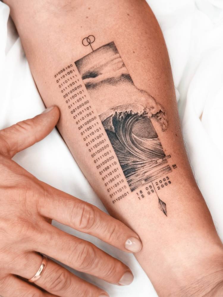 Graphic style wave tattoo located on the inner forearm.