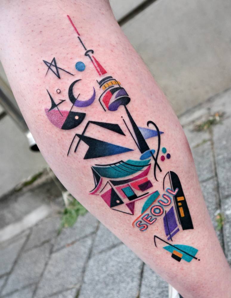 Seoul tattoo in pop art style located on the calf.