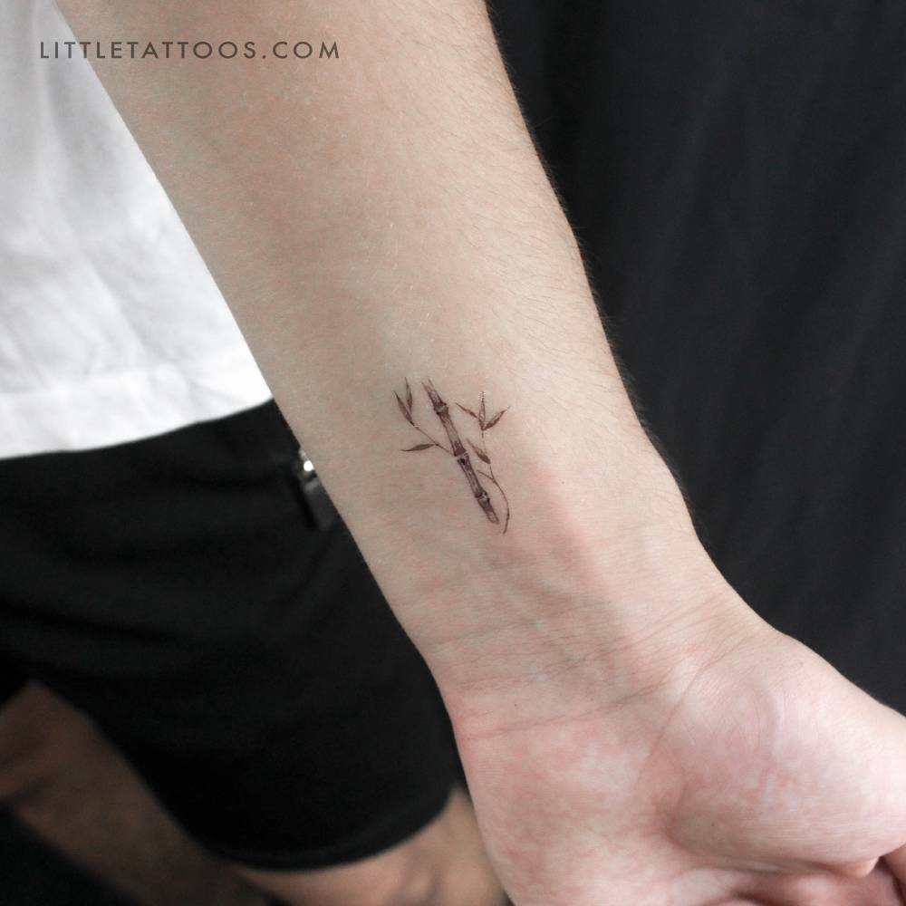 Watercolor style bamboo temporary tattoo placed on the wrist.