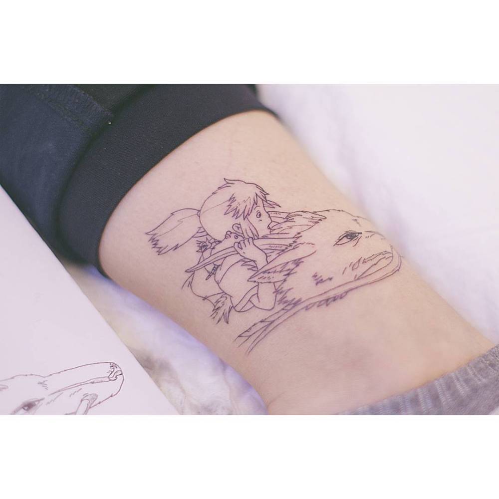 Chihiro and Haku tattooed on the ankle, done in fine line style.