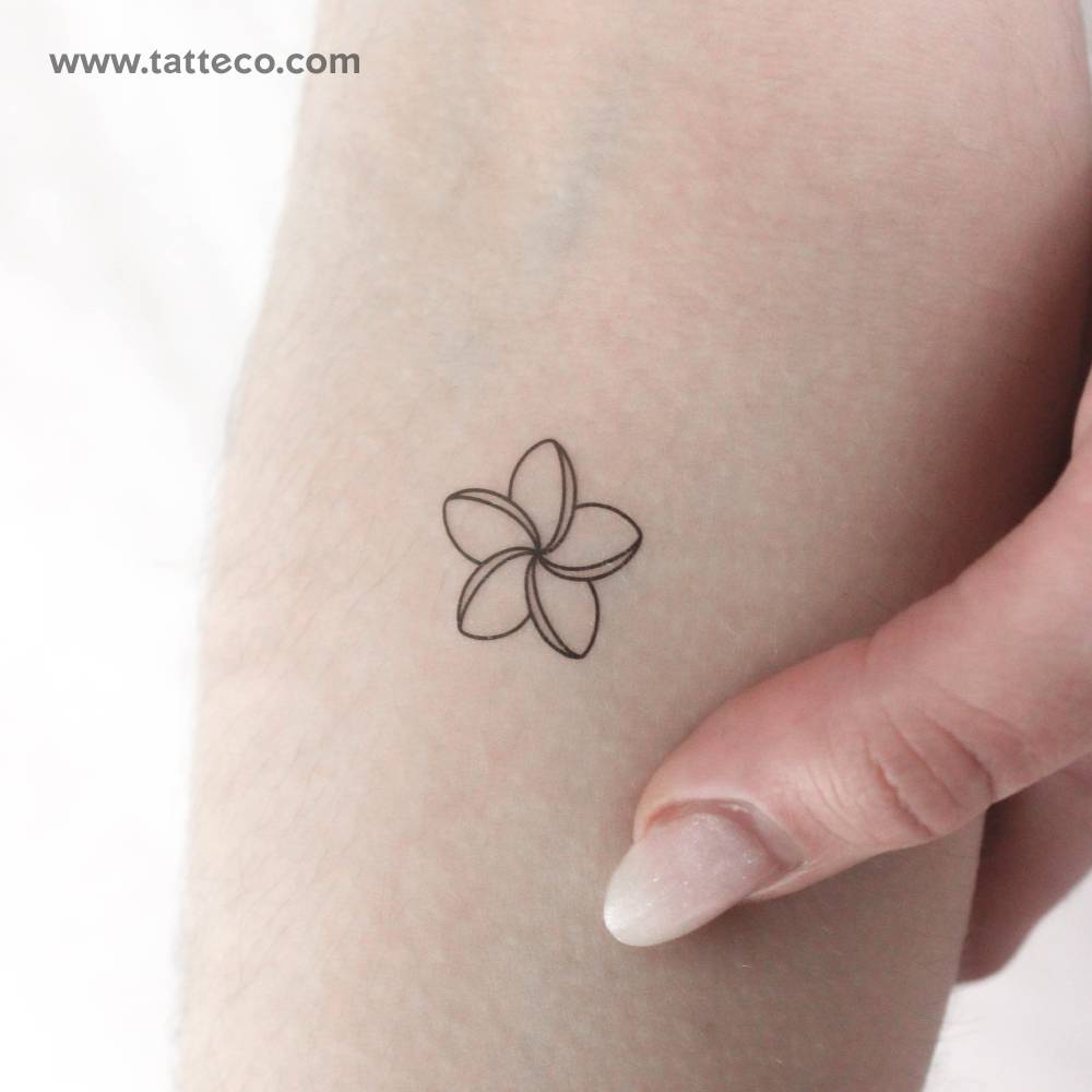 Plumeria temporary tattoo in fine line style located on the inner forearm.