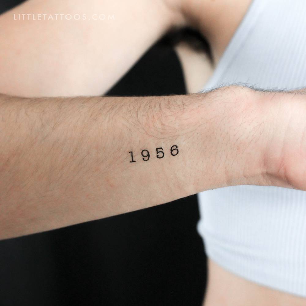 "1956" birth year temporary tattoo located on the wrist.