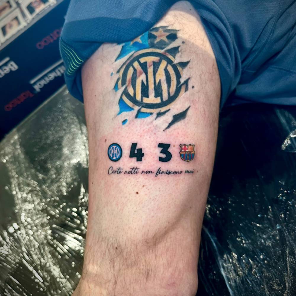 Inter Milan tattoo located on the thigh.