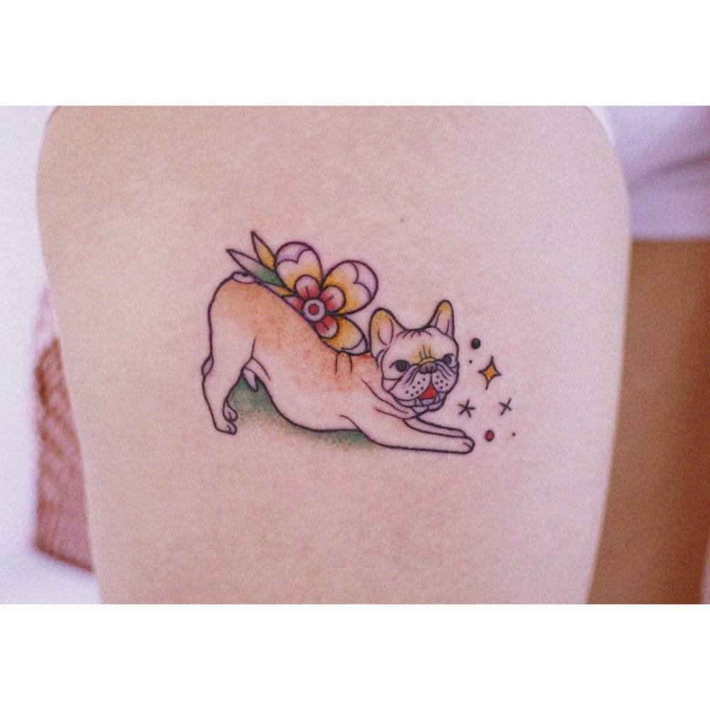 French Bulldog tattoo in illustrative style located on the thigh.