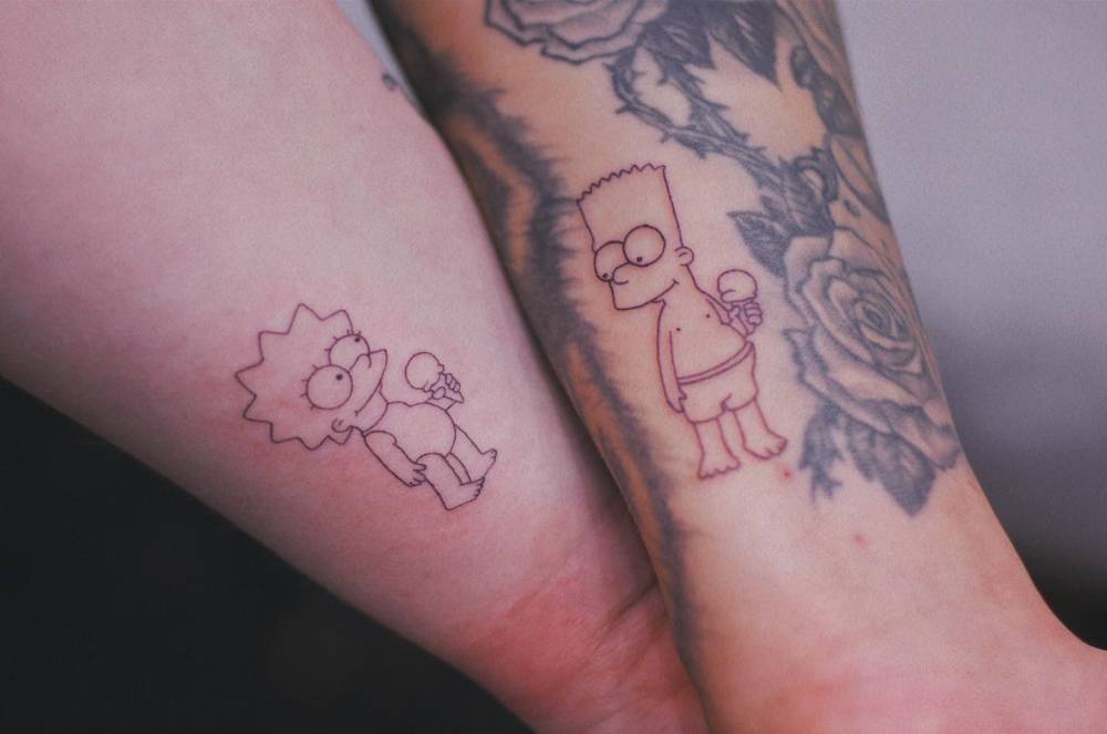 Matching Lisa and Bart Simpson tattoos for couple.