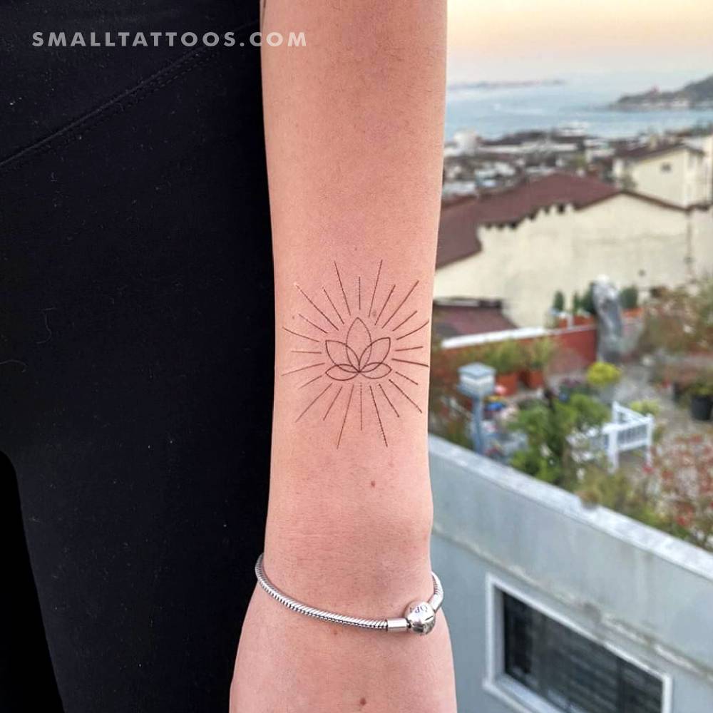 Shiny lotus temporary tattoo by Cagri Durmaz.