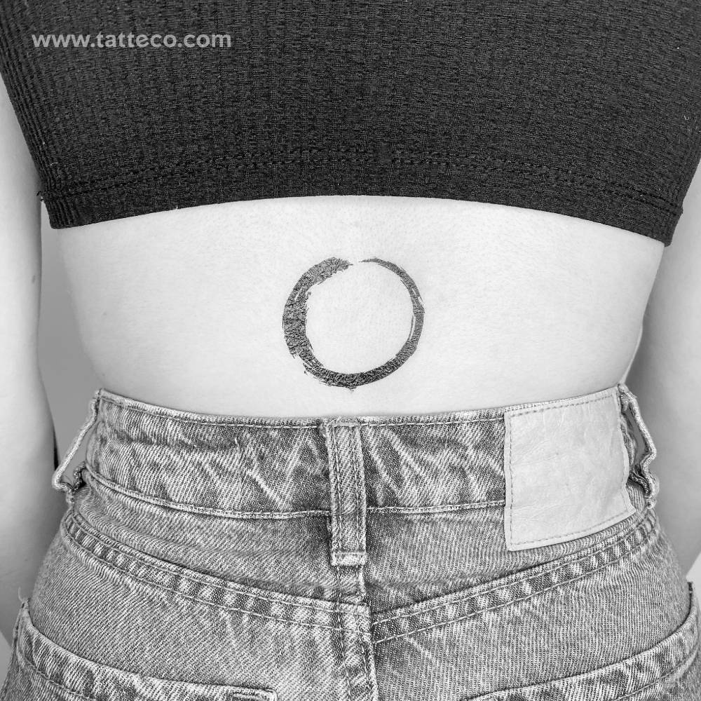 Ensō temporary tattoo located on the lower back.