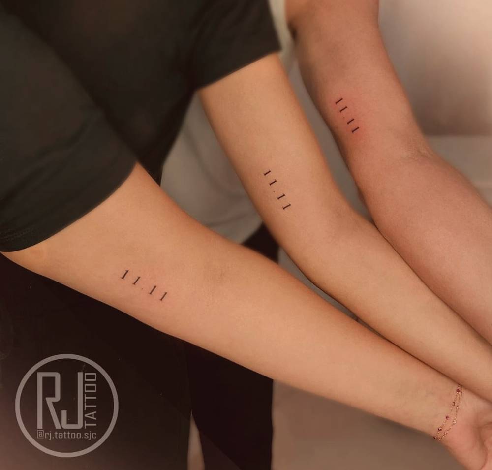Matching angel number "11:11" tattoo for best friends.