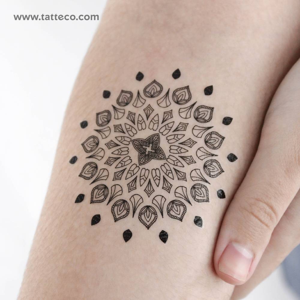 Mandala temporary tattoo placed on the inner forearm.