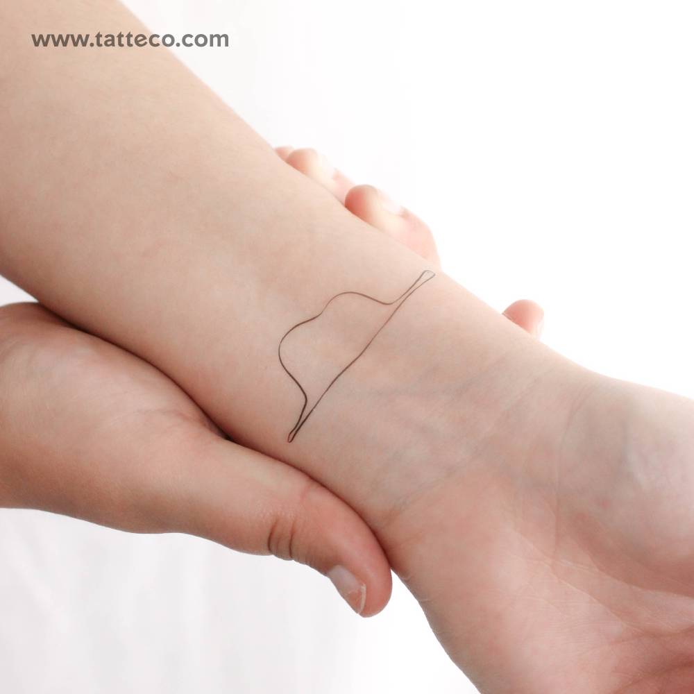 Boa elephant hat temporary tattoo located on the wrist.
