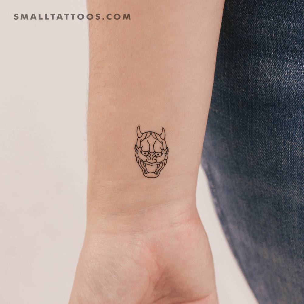 Hannya mask temporary tattoo in fine line style.