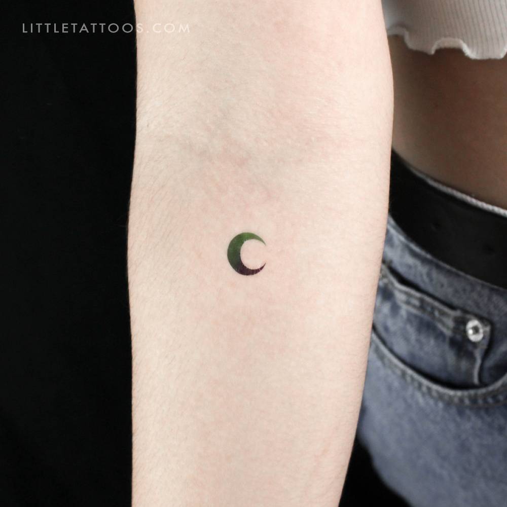 Blue and green crescent moon temporary tattoo.