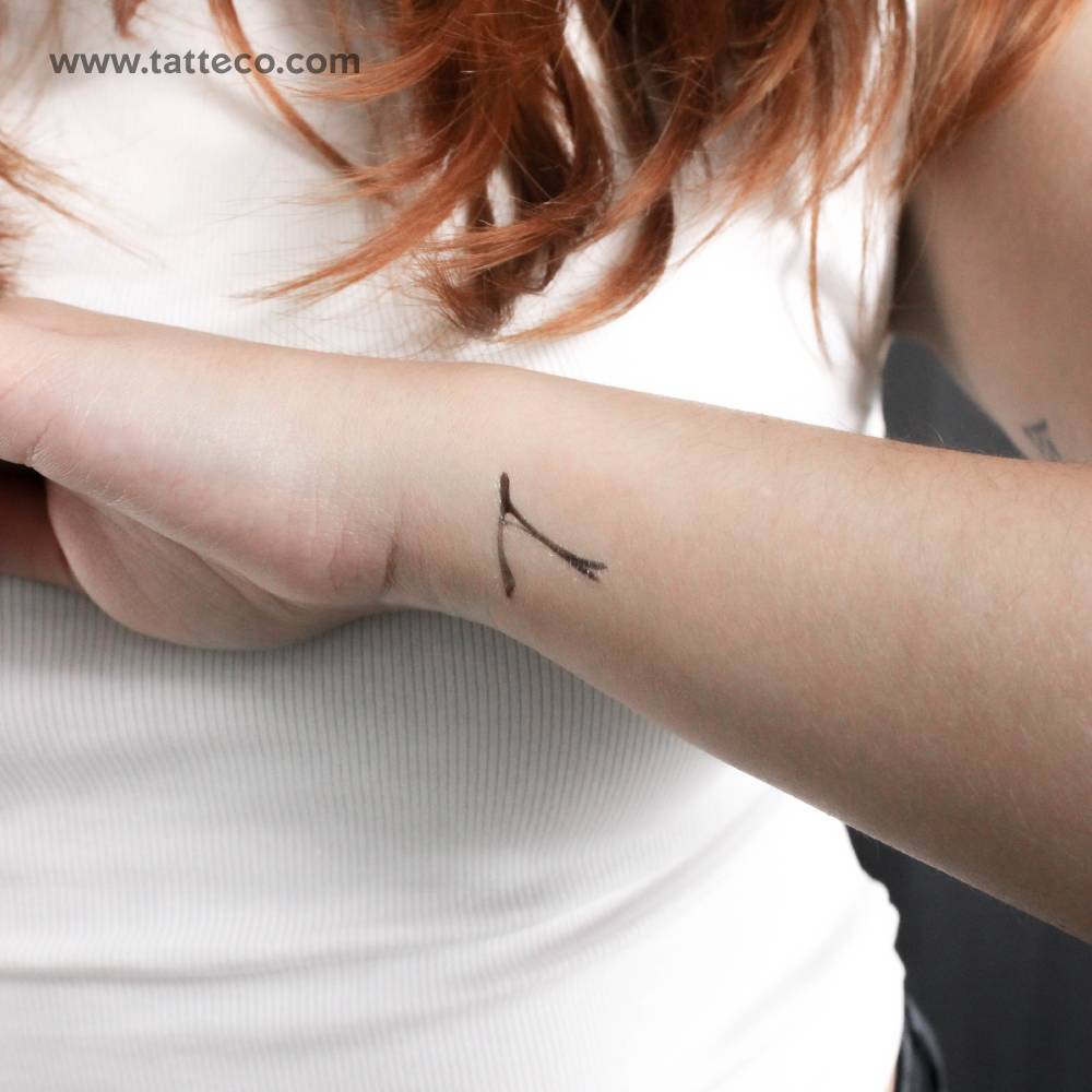 Wishbone temporary tattoo located on the wrist.