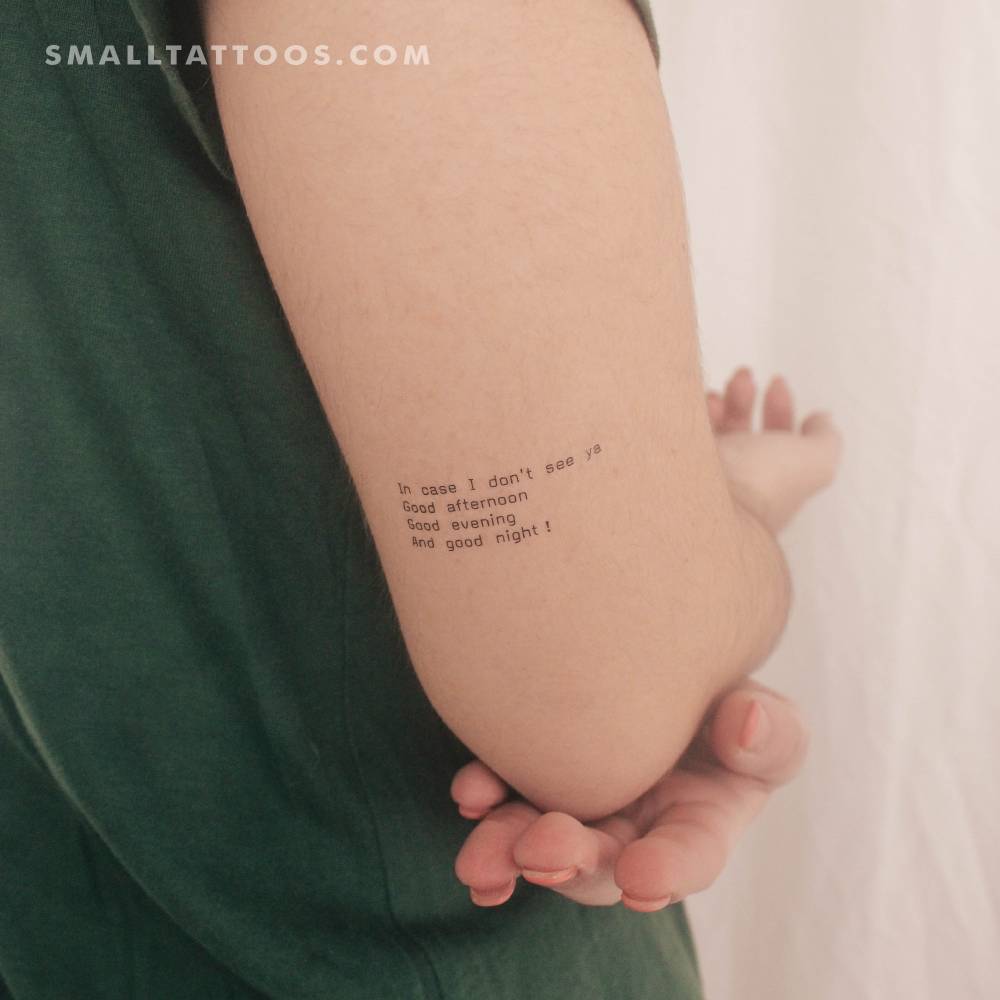 "In case I don't see ya" temporary tattoo located on the tricep.