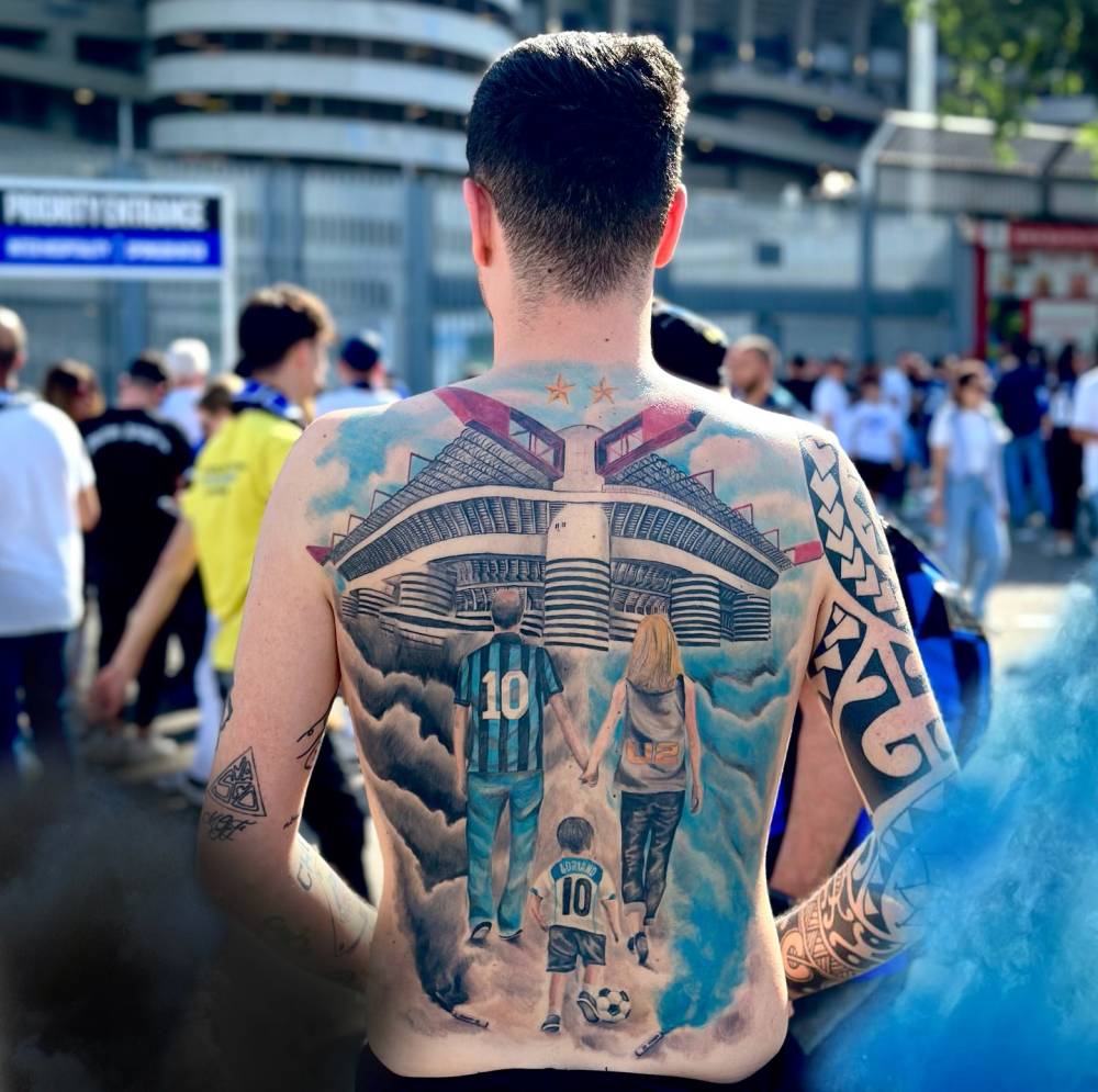 San Siro family portrait tattoo located on the back.