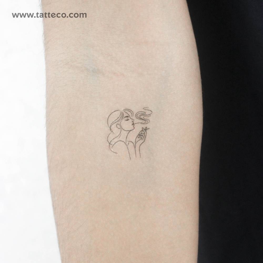 Woman smoking temporary tattoo located on the inner forearm.