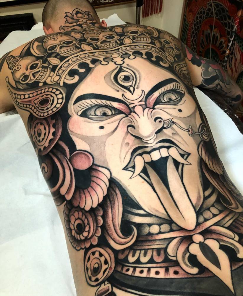 Huge Kali backpiece tattoo.