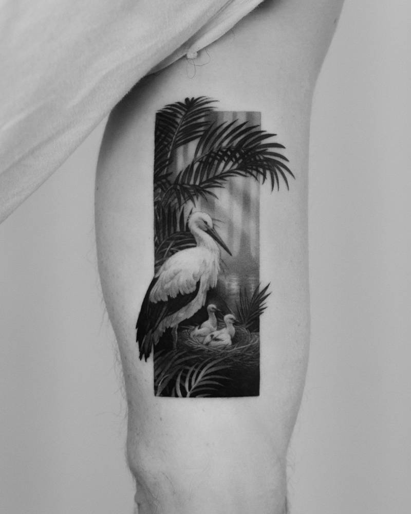 Stork tattoo done in micro-realism located on the inner arm.