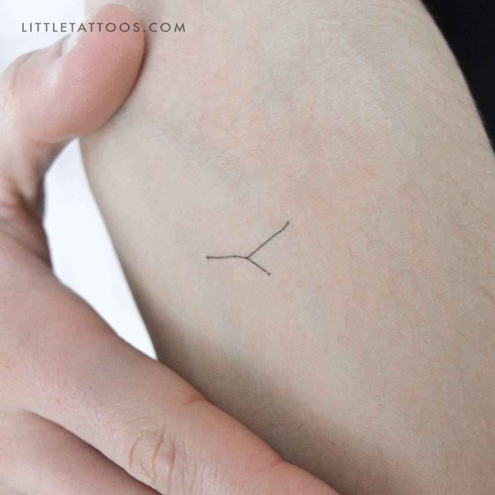 Tiny minimalistic Cancer constellation temporary tattoo.