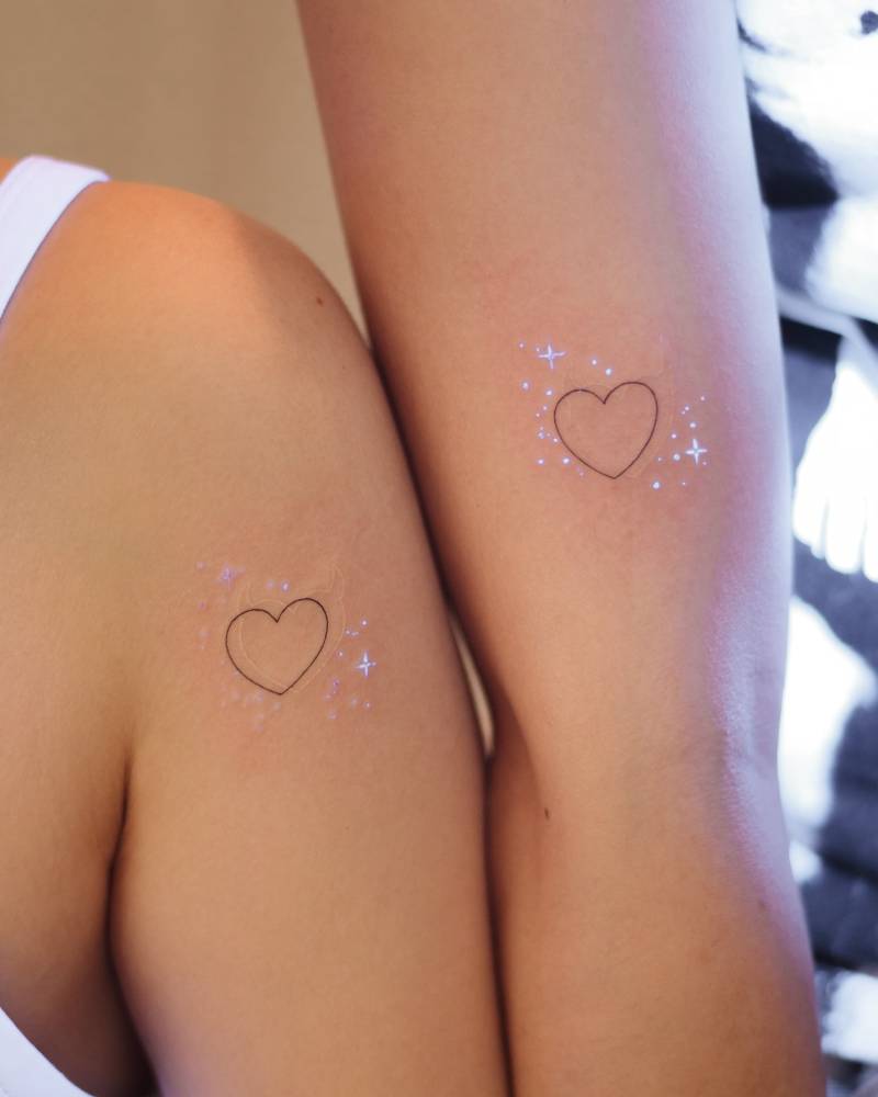 Matching stars and heart tattoo for best friends.