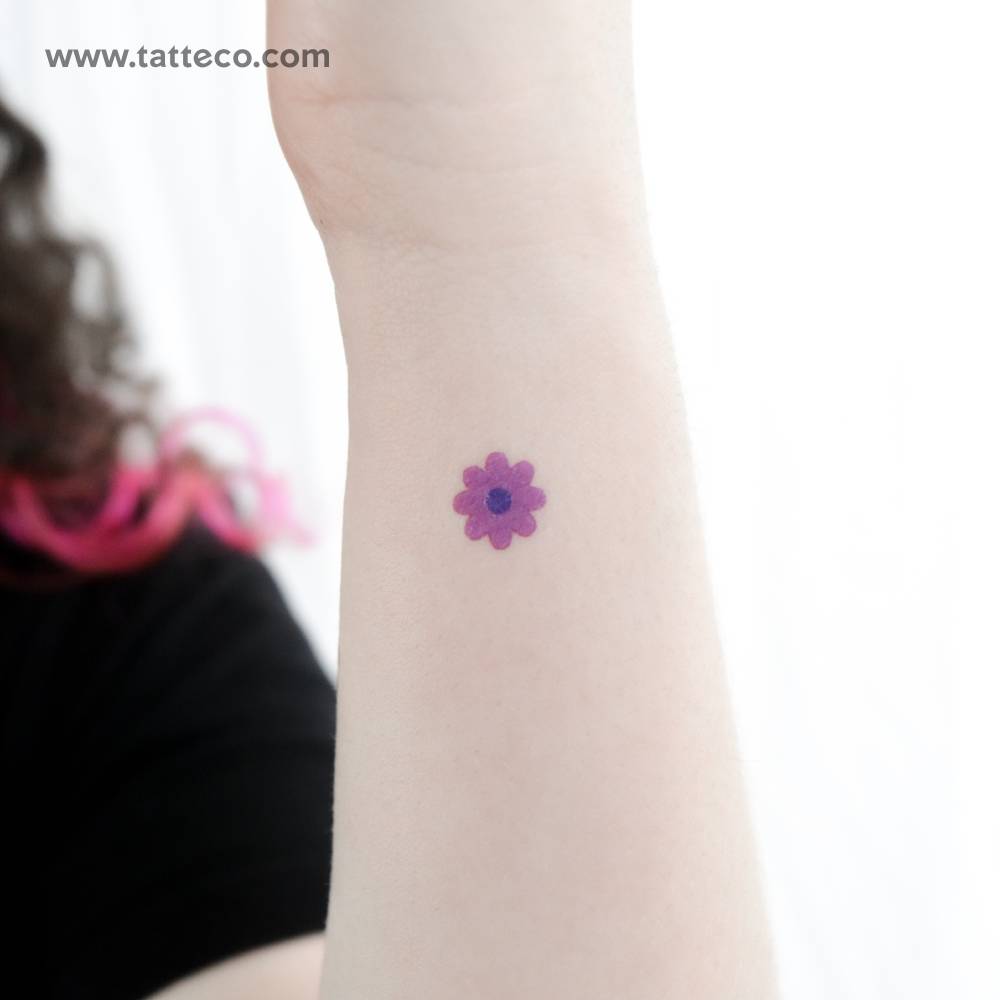 Purple flower temporary tattoo in minimalistic style.