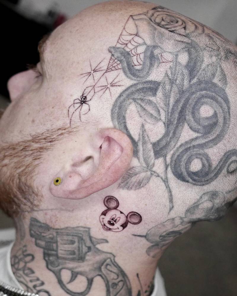 Mickey Mouse tattoo located behind Keith "Bang Bang" McCurdy's ear.