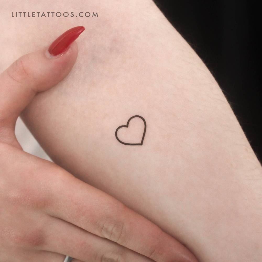 Small minimalistic heart outline temporary tattoo.