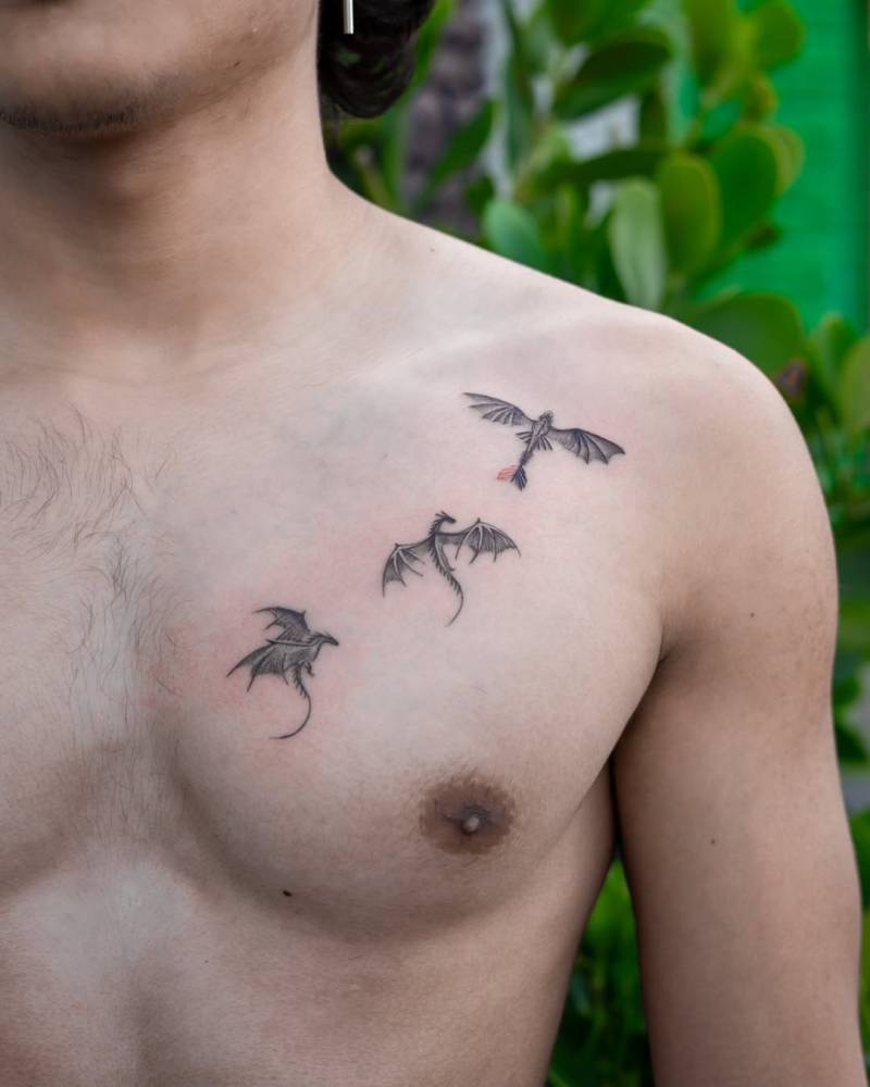 'How to Train Your Dragon' tattoo located on the chest.