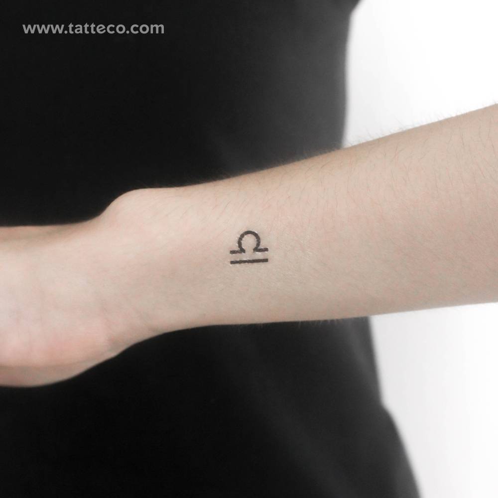 Libra Zodiac symbol temporary tattoo done on the wrist.