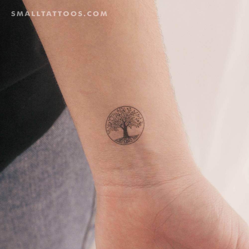 Small Tree Of Life temporary tattoo located on the wrist.