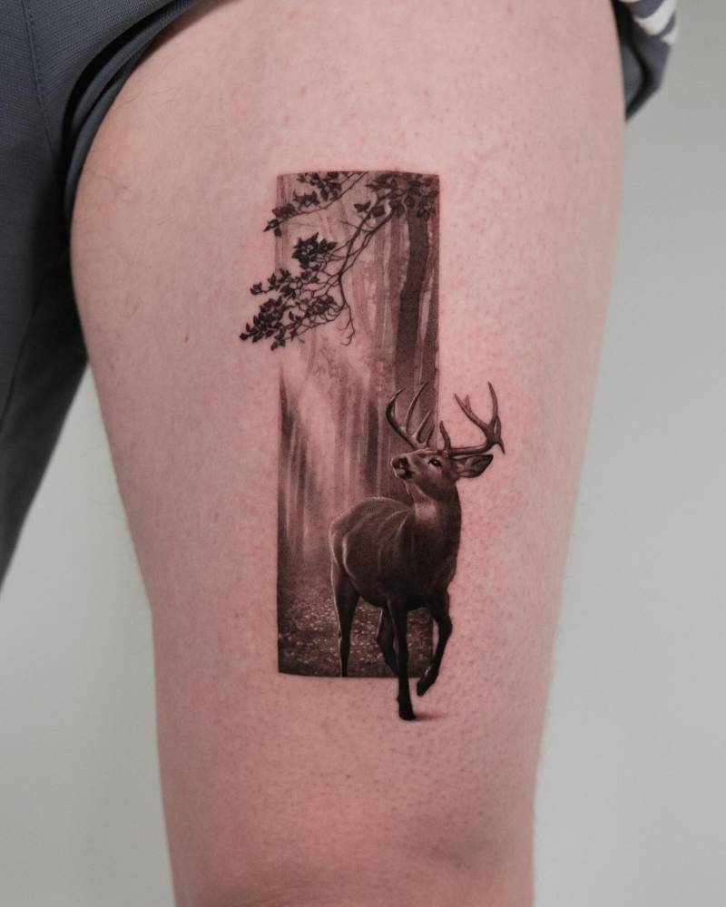 Deer tattoo in micro-realistic style located on the thigh.