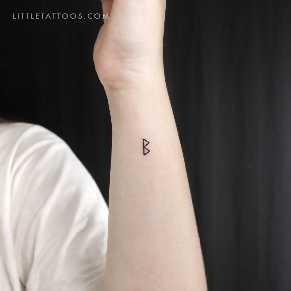 Berkanan rune temporary tattoo located on the wrist.