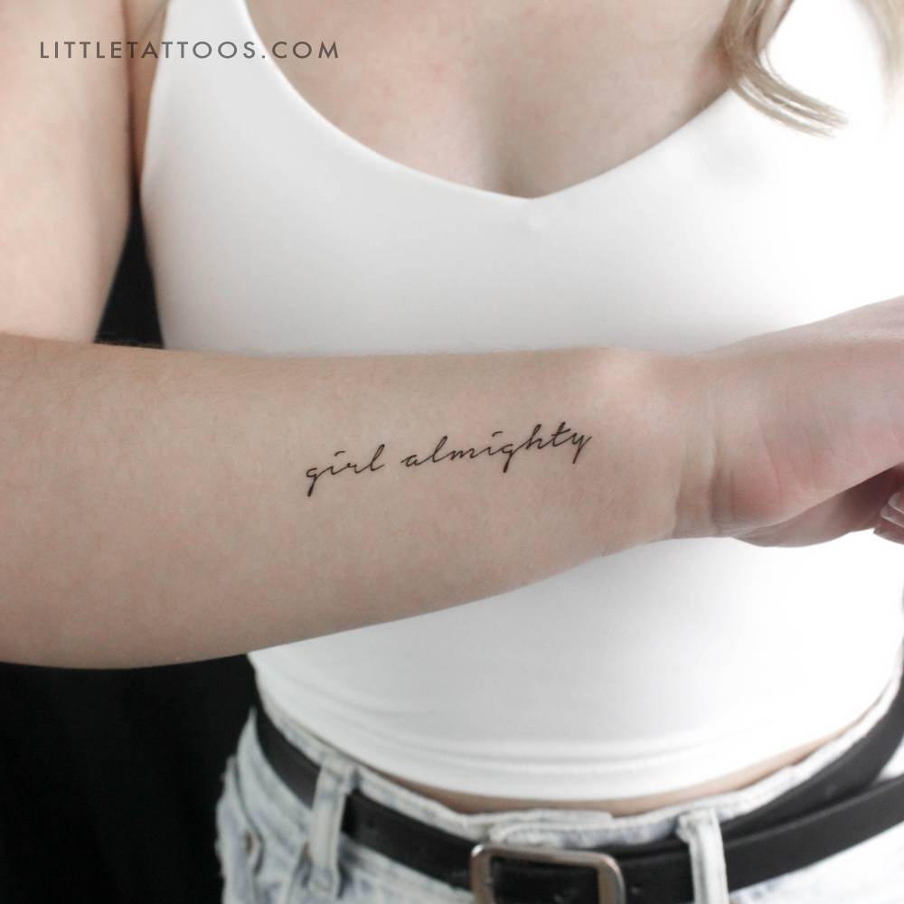 "Girl almighty" temporary tattoo located on the wrist.