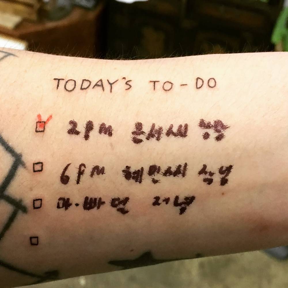To do list tattoo located on the wrist.