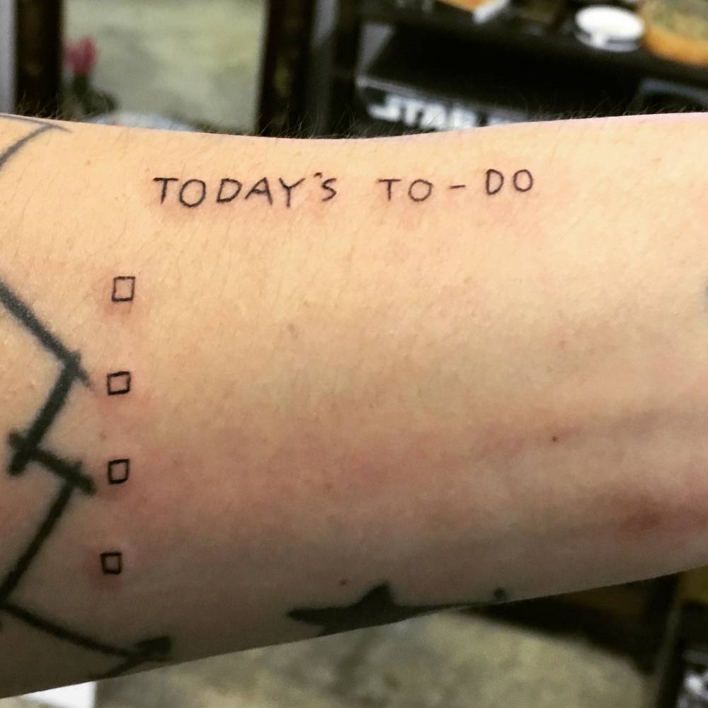 To do list tattoo located on the wrist.