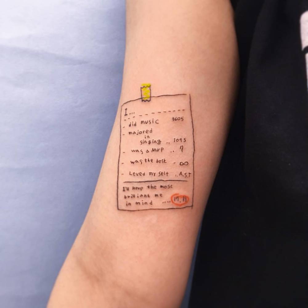 To do list tattoo located on the inner arm.