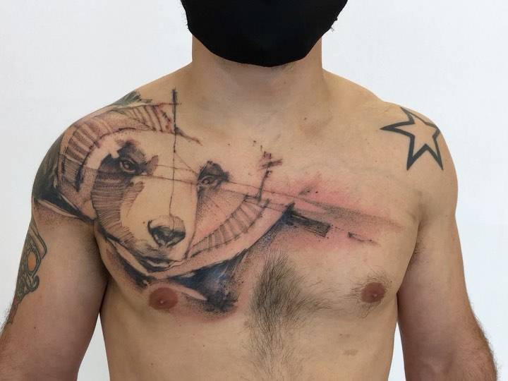 Freehand bear tattoo on the chest/shoulder