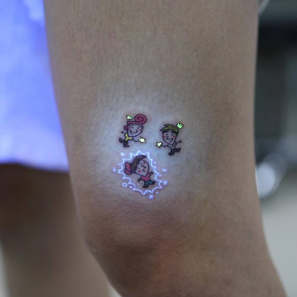 The Fairly OddParents tattoo in carton style placed on the thigh.