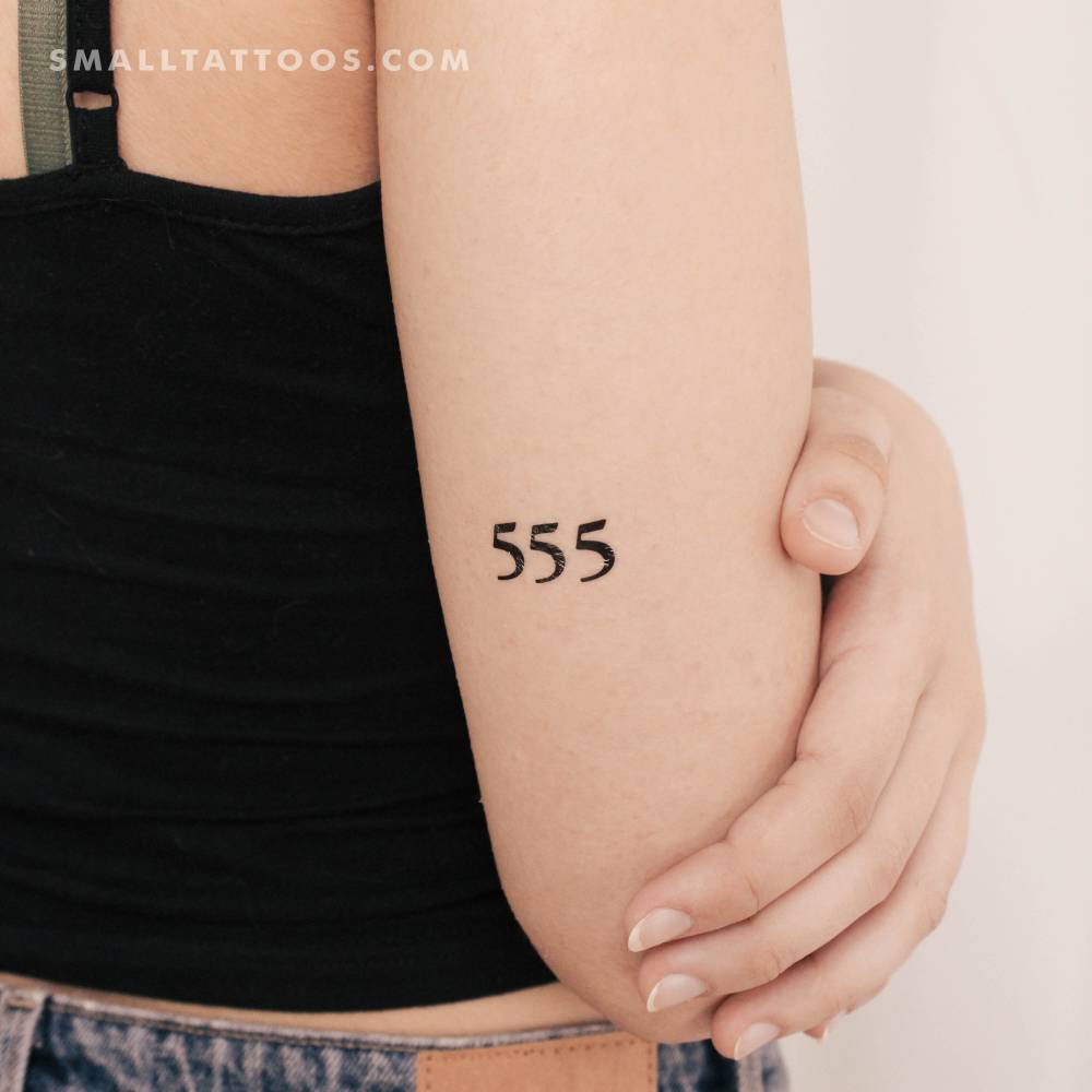 "555" angel number temporary tattoo located on the tricep.