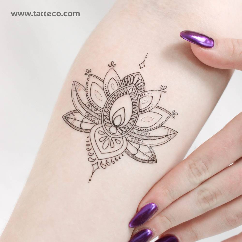 Sacred lotus flower temporary tattoo located on the wrist.