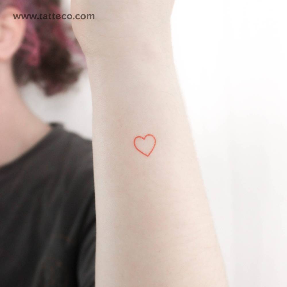 Little red heart outline temporary tattoo.