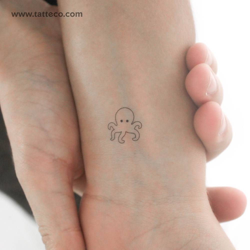 Little minimalistic octopus temporary tattoo located on the wrist.