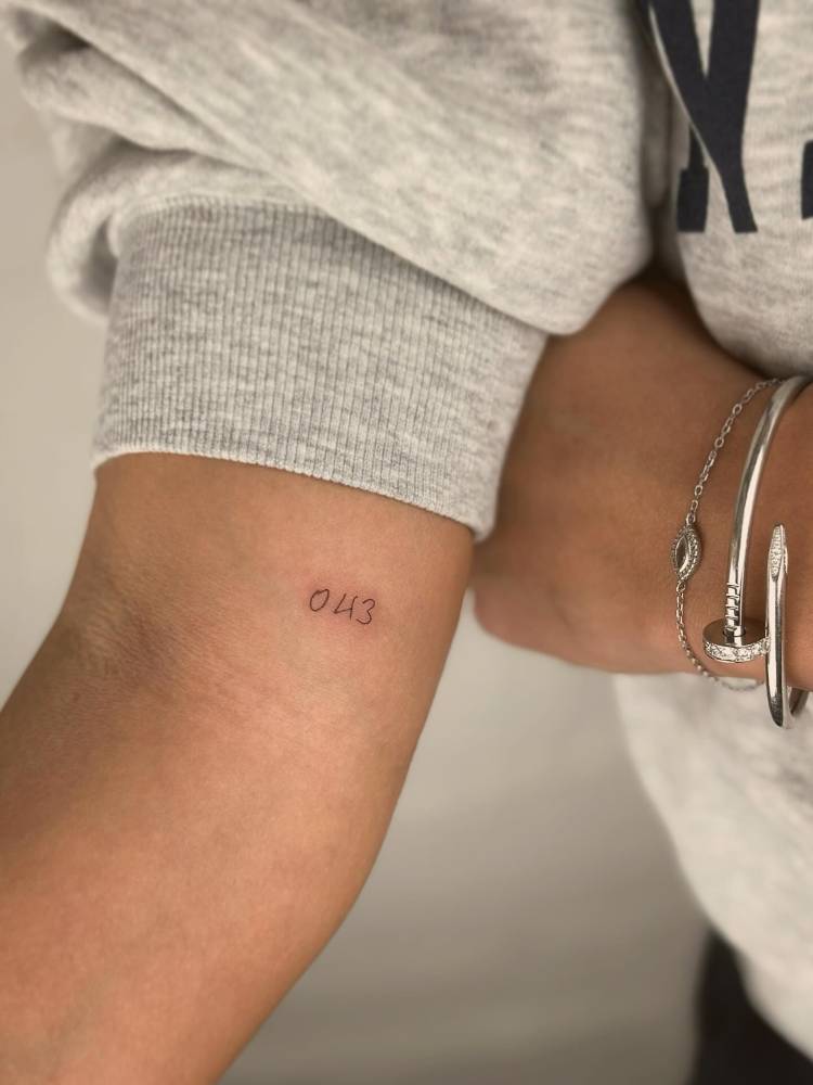 Zero four three tattoo for her dad.