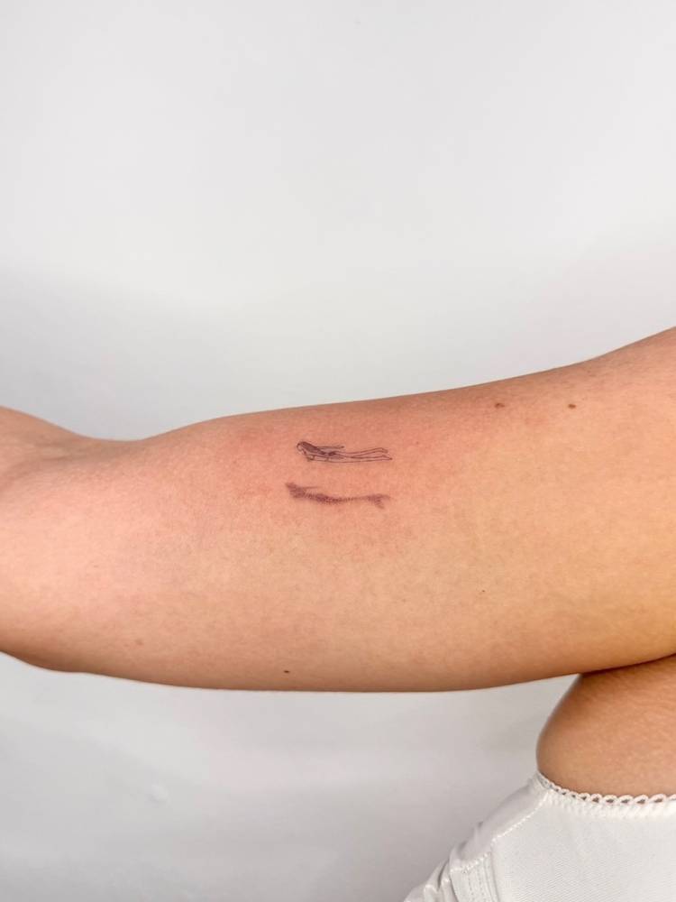 3d effect little swimmer tattoo in illustrative style.