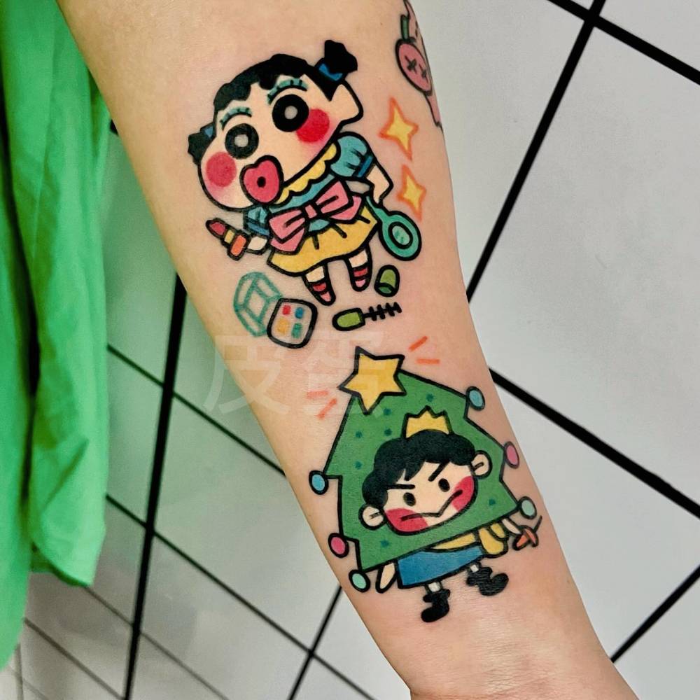 Crayon Shin-Chan tattoo located on the inner forearm.
