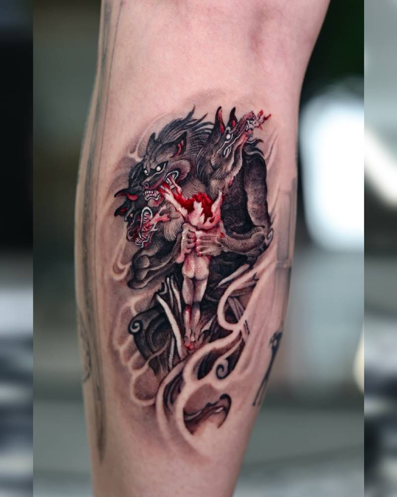 Yokai tattoo in oriental style located on the calf.