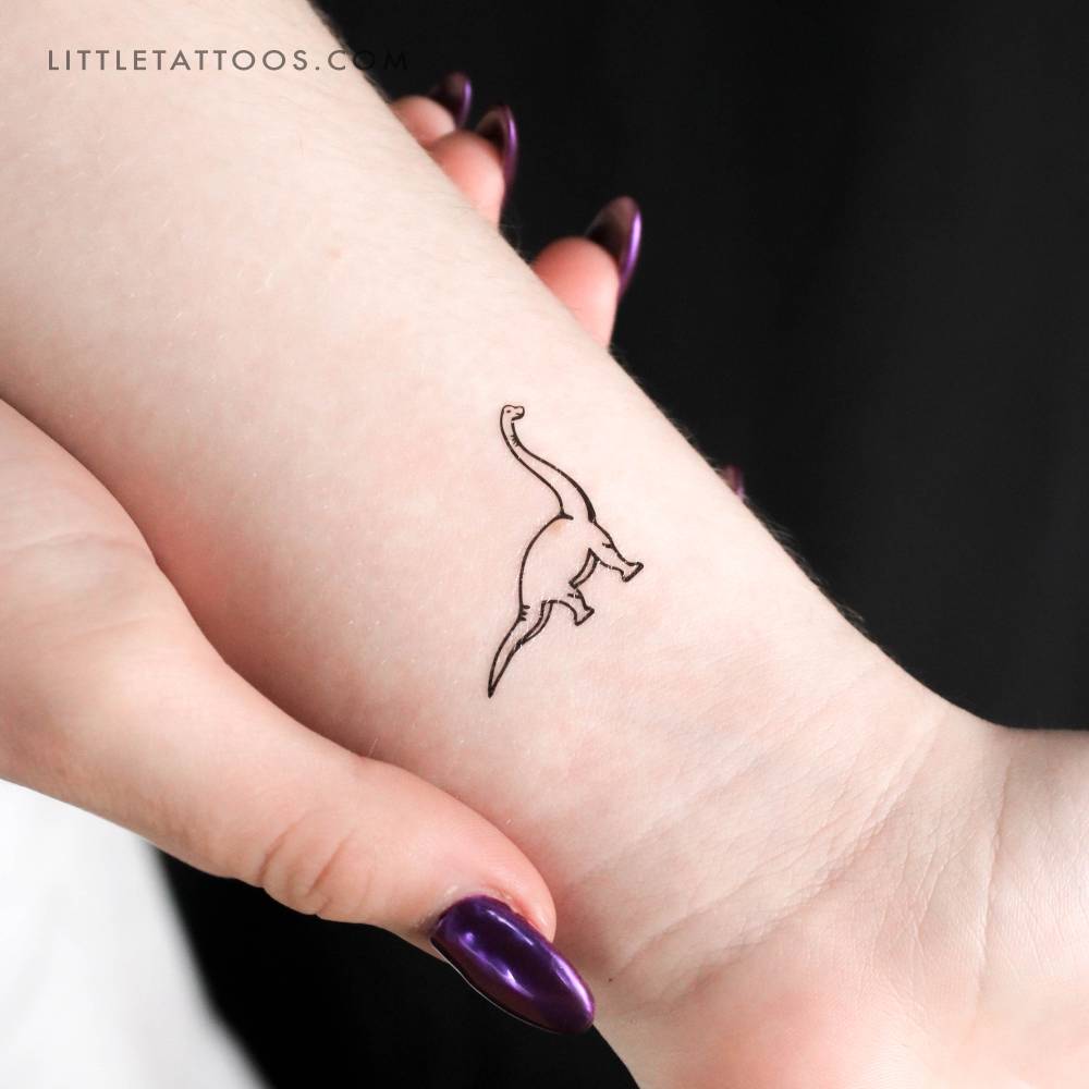 Brontosaurus temporary tattoo located on the wrist.