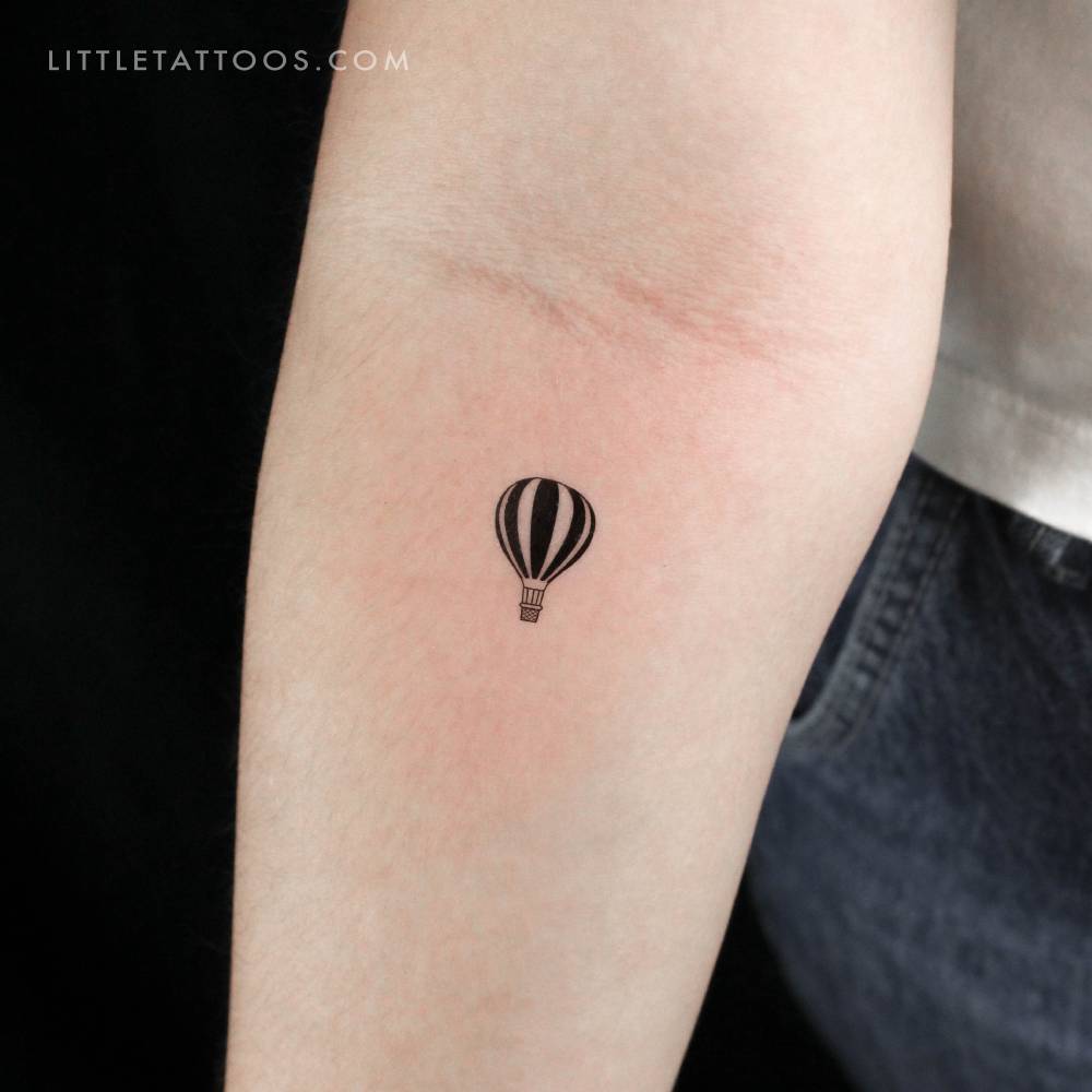 Stripped hot air balloon temporary tattoo in illustrative style.